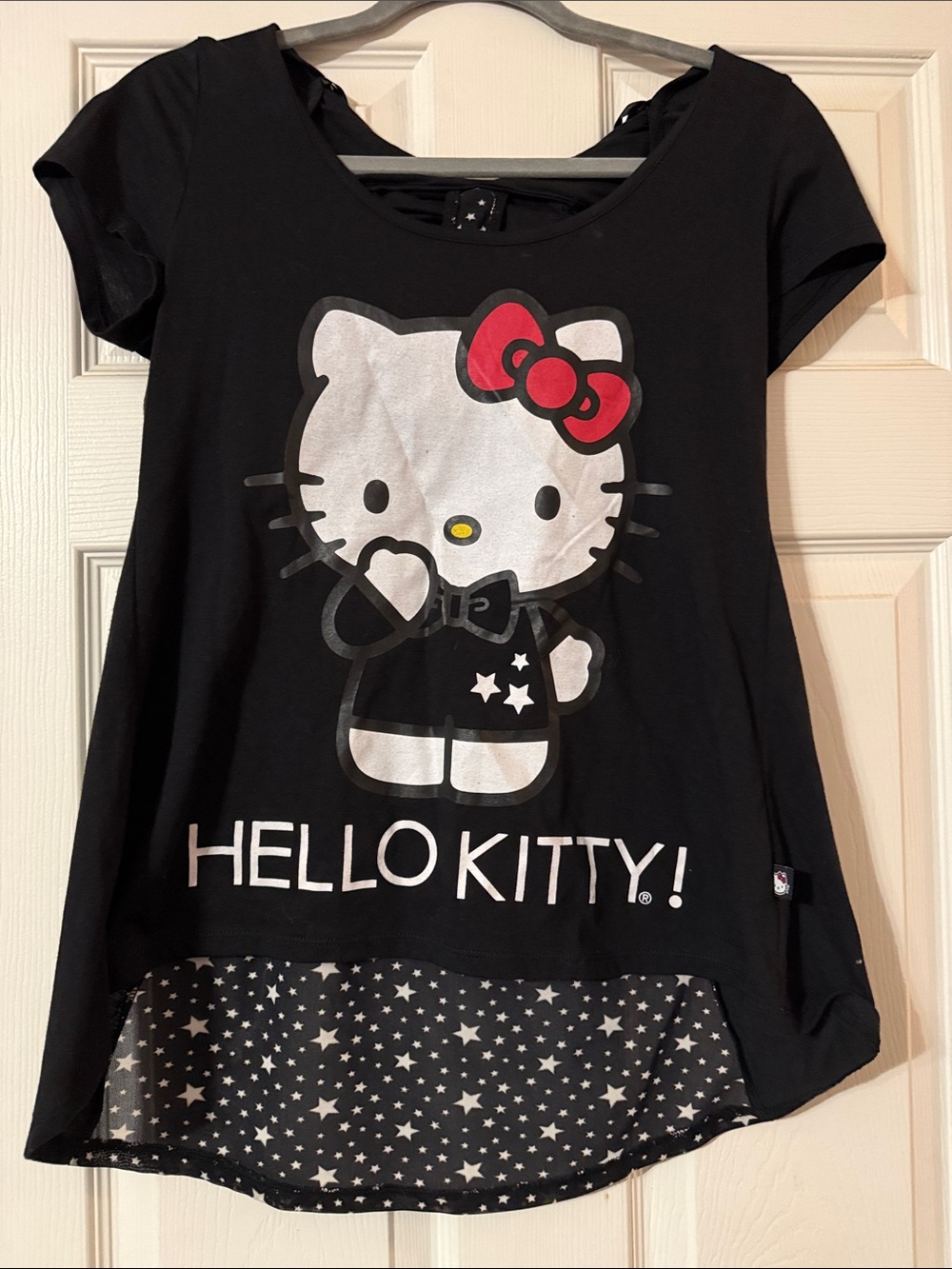 NWOT Hello Kitty Sanrio Black Star Print High-Low Top w/ Sheer Back & Bow - M